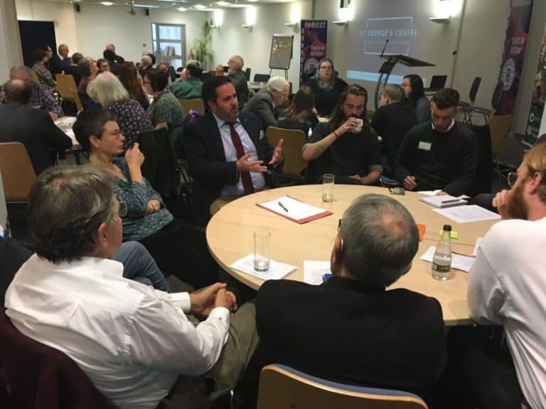 Conference delegates at round tables